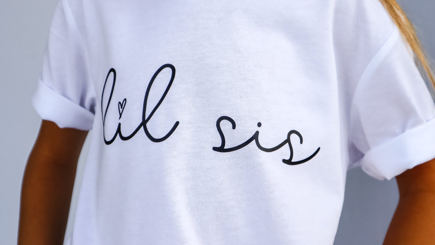 Lil Sis (Cursive) Short Sleeve Crewneck T-Shirt - Kids